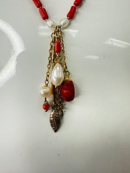 Add a splash of vibrant charm to your look with this 36" necklace featuring rich garnet coral beads and delicate semi-precious accents. Finished with playful coral drops at each end, it’s the perfect accessory to brighten any outfit with a touch of natural beauty and fun. A staple for curated boutique fashion and chic affordable style available at your Women's Boutique West Palm Beach, FL  CS106