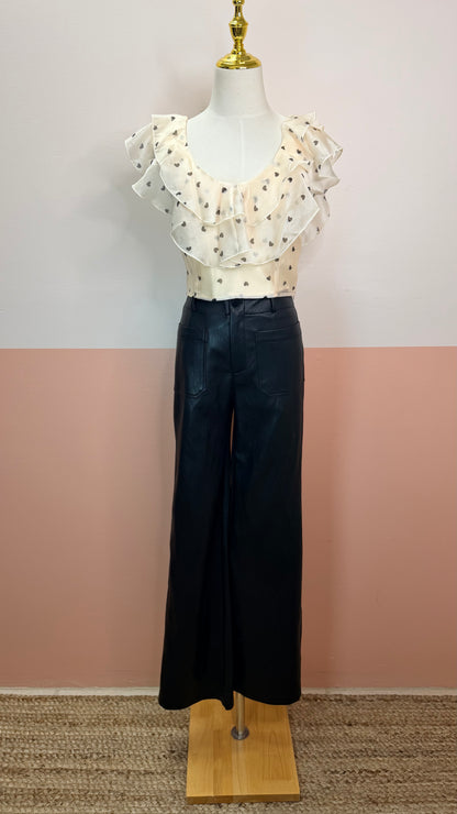 Gia Ruffle Heart Printed Top - The Spark Boutique Gia ruffle top with heart print pattern and delicate ruffle details, close up