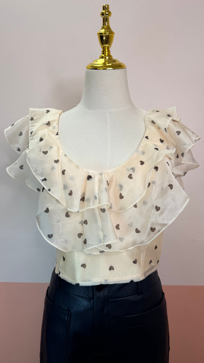 Gia Ruffle Heart Printed Top - The Spark Boutique Gia ruffle top with heart print pattern and delicate ruffle details, close up