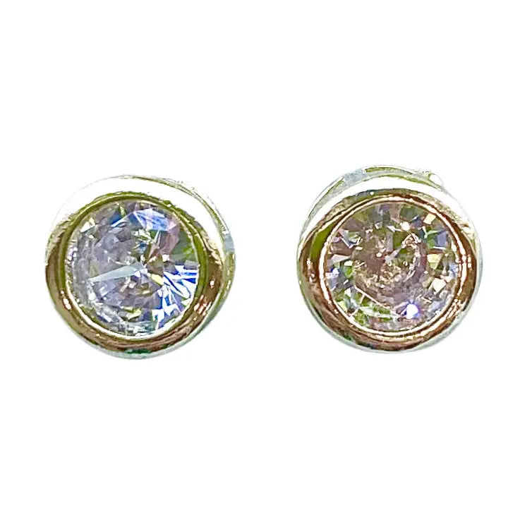 Pair of gold-framed crystal stud earrings on a white background