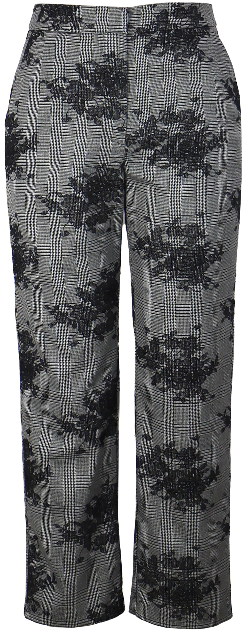 Floral patterned pants on a plain background,a staple for curated boutique fashion and chic affordable style available at your Womens Boutique West Palm Beach, FL.
