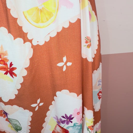 Summer Print, Burnt Orange Color Maxi Dress Halter tie neckline detail on printed summer dress - The Spark Boutique  